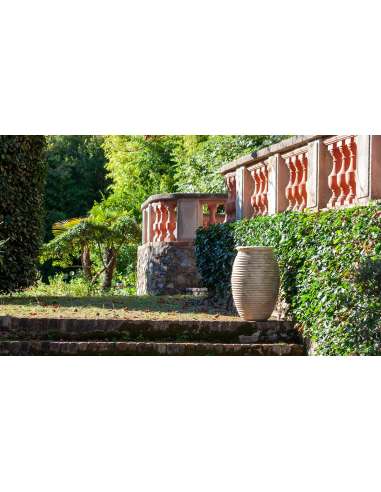 Olive shape striated Biot jar antique patina finish